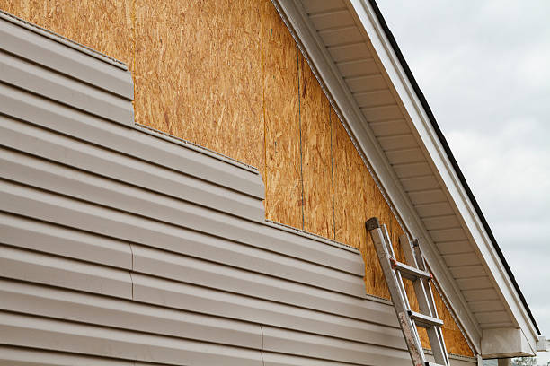Professional Emergency Siding Repair technician working in Enfield, CT
